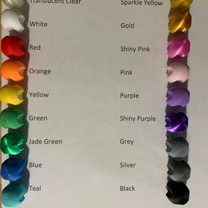 May include: A chart showing 14 different colors of plastic filament for 3D printing. The colors are: Translucent Clear, White, Red, Orange, Yellow, Green, Jade Green, Blue, Teal, Sparkle Yellow, Gold, Shiny Pink, Pink, Purple, Shiny Purple, Grey, Silver, and Black.