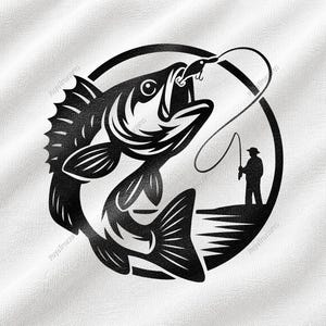 May include: A black and white circular graphic design printed on a white fabric surface. The design features a large fish jumping out of the water with a fishing hook in its mouth, and a silhouette of a person fishing on the shore in the background.