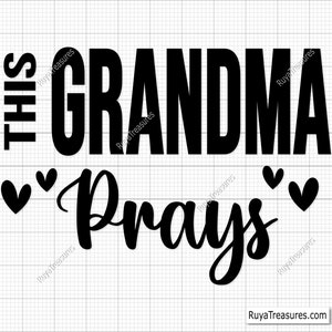 May include: Black and white graphic text that reads "This Grandma Prays" with four small hearts surrounding the word "Prays".