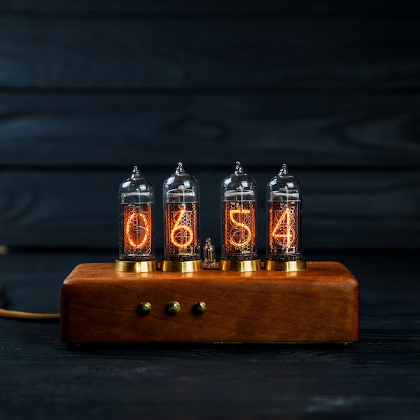 Nixie tube clock  (IN-14 tubes), made of eucalyptus and brass .