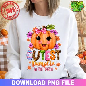 May include: White sweatshirt featuring a cartoon pumpkin with a pink bow, surrounded by flowers and autumn leaves. The text "CUTEST Pumpkin IN THE PATCH" is displayed below the pumpkin. The design includes the text "DOWNLOAD PNG FILE".