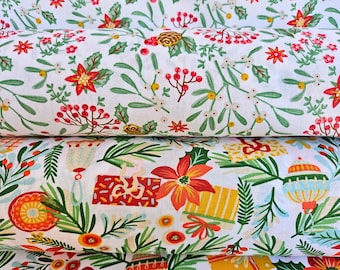 May include: Two rolls of white fabric with a festive Christmas pattern. The top roll features red poinsettias, berries, and green leaves. The bottom roll has gift boxes, ornaments, and flowers in red, orange, and yellow.