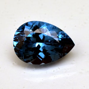Natural London Blue Topaz: 10.95 Ct Pear Cut Gemstone