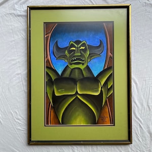 May include: Framed painting of a green, demonic figure with horns and a menacing expression. The figure is set against a dark blue background with a brown frame. The painting is signed "Rick Zum 8/27/76".