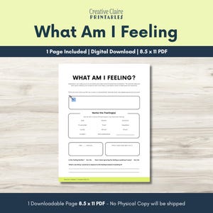 May include: A digital download worksheet titled What Am I Feeling, measuring 8.5 by 11 inches. The white page features black text, a large rectangular box for writing, a checklist of emotions, and prompts to identify feelings and needs.