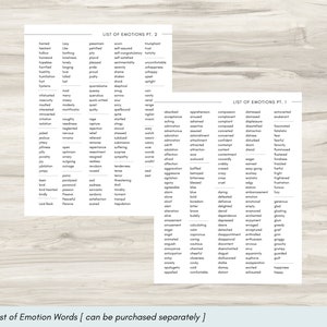 May include: Two black and white printable lists of emotion words. The first list is titled "List of Emotions Pt. 1" and the second list is titled "List of Emotions Pt. 2". The lists are on a woodgrain background.