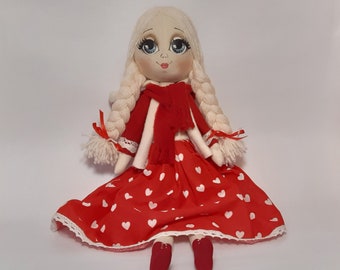 A doll in red. Art, collectible, children's, textile rag cloth doll for girl, mom, woman for mother's day, birthday