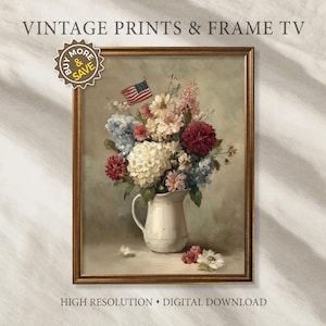 May include: A framed vintage print of a floral arrangement in a white pitcher, with an American flag. The flowers are in shades of red, white, blue, and pink. The frame is a warm brown color. Text at the top reads "VINTAGE PRINTS & FRAME TV".