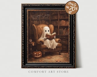 May include: A framed print featuring a ghost reading a book in a cozy armchair, set against a backdrop of a library. The artwork has a Halloween theme, with pumpkins and autumn leaves. The frame is black, and the text "COMFORT ART STORE" is at the bottom.