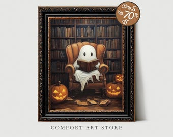 May include: A framed print featuring a friendly ghost reading a book in a cozy armchair, with a bookshelf backdrop and jack-o'-lanterns. The artwork has a vintage style and the text "Comfort Art Store" is at the bottom.
