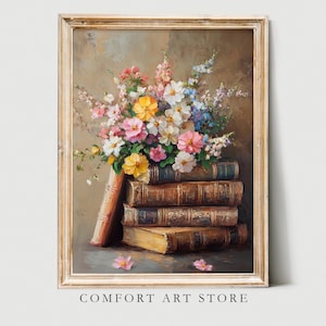 May include: A painting of a bouquet of pink, white, and yellow flowers arranged on top of a stack of old books. The books are bound in brown leather and have gold lettering on the spines.