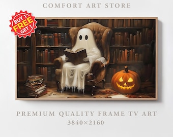 May include: A framed print depicts a ghost reading a book in a library setting, with a carved pumpkin and stacks of books. The artwork is labeled "Comfort Art Store" and "Premium Quality Frame TV Art 3840x2160". A "Buy 1 Get 1 Free" sticker is in the upper left corner.