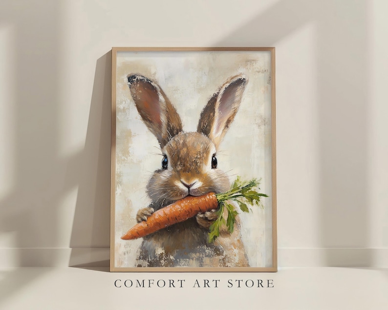 May include: A painting of a brown rabbit with large ears holding a carrot in its mouth. The rabbit is looking directly at the viewer. The background is a light beige with a textured look.