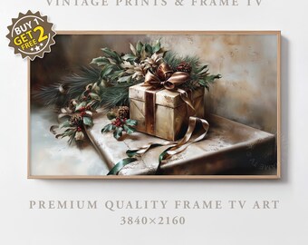 May include: A framed print featuring a still life of a gift box with a brown ribbon, placed on top of a wrapped present. The image is decorated with pine branches, pine cones, and berries. The text "VINTAGE PRINTS & FRAME TV" is at the top.