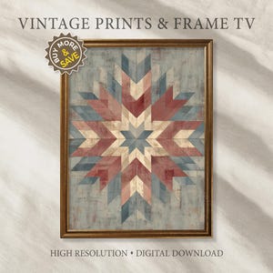 May include: Framed wall art featuring a geometric starburst design in shades of red, blue, and cream. The artwork is set against a distressed, light blue background and framed in a gold-toned wood. The text "VINTAGE PRINTS & FRAME TV" is at the top.