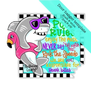May include: A door hanger featuring a cartoon shark wearing sunglasses and a pink inflatable flamingo. The text reads "Pool Rules: Enjoy the music, NEVER say "Y'all watch this!" Rock the Speedo, We are [not] Responsible for Shark Bites."