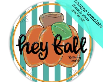 May include: A circular door hanger template featuring a teal and white vertical striped background. The design includes three orange pumpkins with a green leaf and brown stem, with the black text hey fall and Restoring Lovely printed on it.