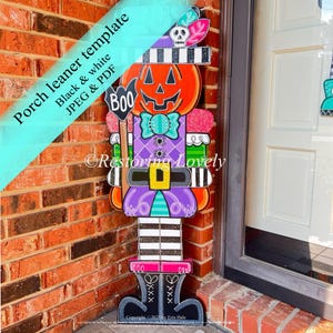 May include: A colorful Halloween porch leaner in the shape of a witch with a pumpkin head. The witch is wearing a purple dress, a black and white striped hat, and black boots. The text "Boo" is on a sign. The words "Porch leaner template" are also visible.