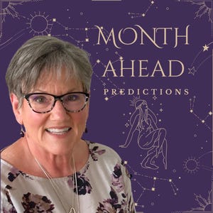 May include: A person with short gray hair and glasses wearing a floral print top, positioned in front of a purple background featuring the text MONTH AHEAD PREDICTIONS, celestial line art, and a seated figure illustration in white ink.