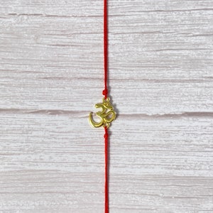 Handgefertigtes Om Rakri aus Baumwolle - Wählen Sie zwischen einem einzelnen Rakri oder einem 4er-Pack - Rakri Rakhi Rakree Raksha Bandhanfaden Armband, Geschwister
