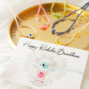 Mehrfarbiger Nazar, Schutz vor dem Bösen, handgefertigter Baumwoll-Rakhi - Multipack - Rakhi Rakhir Raksha Bandhanfaden, Geschwister