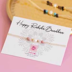 Kristall umgeben von Liebe Handmade Cotton Rakri | Rosenquarz | Rhodonit - Rakir, Rakhi Rakhir, Raksha Bandhan