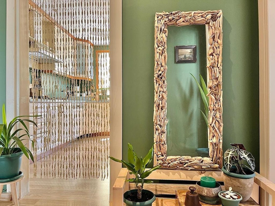 i built this mirror wall, using LOTS mirror tiles and some wood