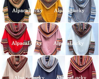 Può includere: Nove poncho in lana di alpaca di diversi colori, ognuno con collo a lupetto e bordatura con motivo geometrico. I poncho sono esposti su uno sfondo bianco. Alpaca Lucky è stampato su ogni poncho.