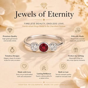 May include: A silver-toned ring featuring a central round red gemstone flanked by two smaller round clear gemstones. The image includes the text Jewels of Eternity, Timeless Beauty, Endless Love, Handcrafted Rings Made to Be Cherished Forever, and Crafted to Celebrate, Made to Last Forever.