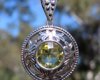 Lemon topaz pendant with faceted gemstone, sterling silver leaf jewellery