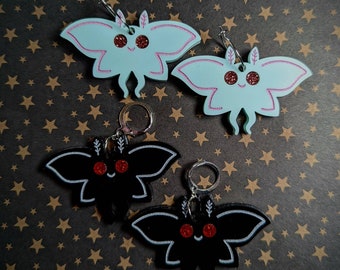 Pendientes de hombre polilla