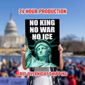 May include: A black sign with the Statue of Liberty and the words "NO KING NO WAR NO ICE" in white. The sign is held up in front of a crowd with the text "24 HOUR PRODUCTION" and "FREE OVERNIGHT SHIPPING".