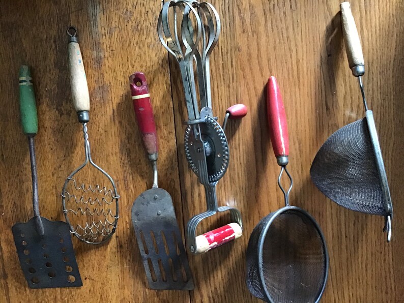 This listing is for 6 antique kitchen gadgets. Etsy