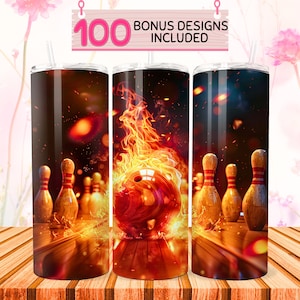 May include: A stainless steel tumbler with a bowling ball and pins design. The bowling ball is on fire and the pins are scattered around it. The tumbler has a black background and a glossy finish.