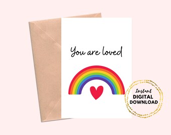 May include: A printable card with a rainbow and a red heart, with the text "You are loved".