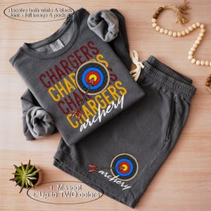 May include: A gray sweatshirt and matching shorts with a target and arrow design. The text "CHARGERS archery" is printed on the sweatshirt.