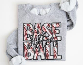 May include: Gray sweatshirt with the words "BASE sixteen BALL" in black lettering. The letters are outlined with a red and white baseball stitch pattern.