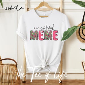 Meme white tshirt, Pretty Meme shirt, New Meme shirt, Unique Meme shirt, New Meme gift, Meme pregnancy reveal tee, Bright floral meme shirt