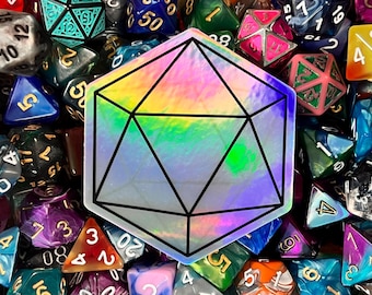 May include: A holographic iridescent sticker of a 20-sided die, also known as a d20, surrounded by a variety of colourful dice.
