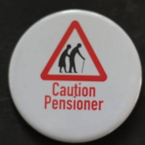 Caution Pensioner Road Sign Badge