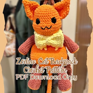 Peut inclure: Sac à dos en crochet en forme de chat orange et marron avec un nœud jaune. Le sac à dos est un modèle de crochet en PDF à télécharger uniquement.  Sac à dos chat du zodiaque Modèle de crochet en PDF Téléchargement uniquement.