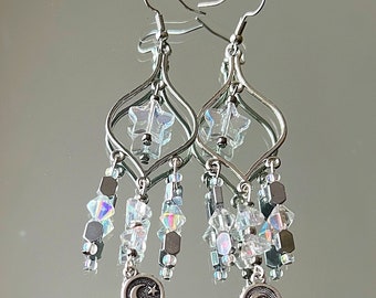 chandelier earrings with celestial star and moon three tier iridescent and silver accent beads
