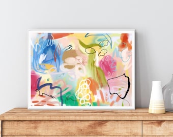 May include: Abstract art print with a colorful, layered design featuring swirls, lines, and shapes in shades of pink, blue, green, yellow, and orange. The print is framed in a white frame.