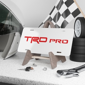 Toyota TRD Aluminum Vanity License Plate Red / White