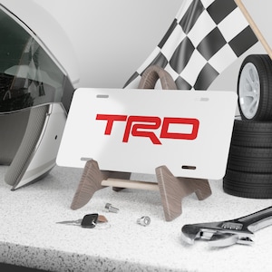 Toyota TRD Aluminum Vanity License Plate Red / White