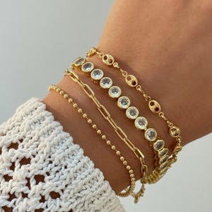 Stackable Bracelets Gold Set Layering Jewelry Collection Dainty Bracelets Herringbone Design Minimalist Gold Chain Bracelet Delicate Thin Chain Paperclip Link Style Everyday Jewelry Essentials Gold Bracelet Set Women Elegant Layering