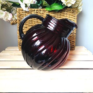 Vintage Anchor Hocking Ruby Red Swirl Glass Pitcher with Ice Lip