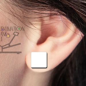 May include: A white square earring stud is shown in an ear. The earring is a blank sublimation product. The text "SUBLIMATION BLANKS .NET" is visible in the upper left corner of the image.