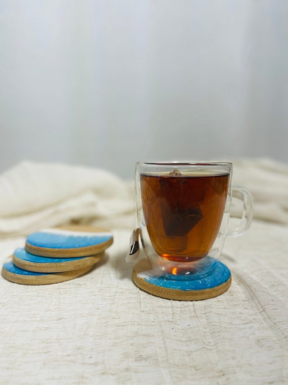 Oceanic Elegance: Handcrafted Bamboo Coasters with Resin Wave Accents