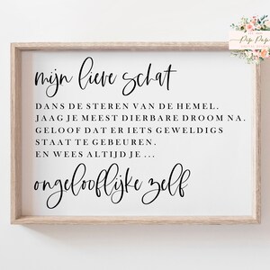 Pode incluir: Uma impressão emoldurada com fundo branco e texto preto. O texto diz "mijn lieve schat" e inclui uma citação em holandês: "DANS DE STEREN VAN DE HEMEL. JAAG JE MEEST DIERBARE DROOM NA. GELOOF DAT ER IETS GEWELDIGS STAAT TE GEBEUREN. EN WEES ALTIJD JE...ongelooflijke zelf"